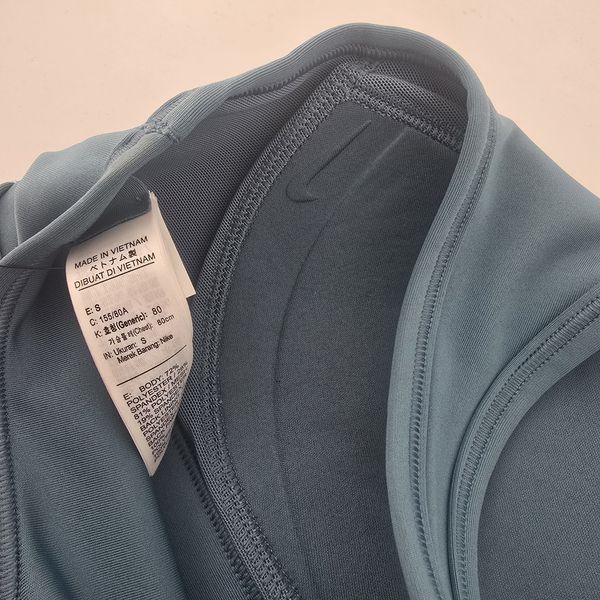 Женский спортивный топ Nike Swoosh DX6822-006 голубой с поддержкой S DX6822-006S фото